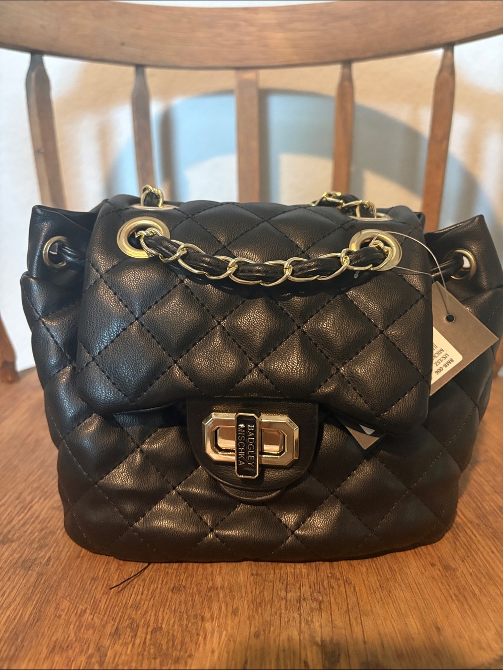 Black Quilted Shoulder Bag with Gold Chain Handle